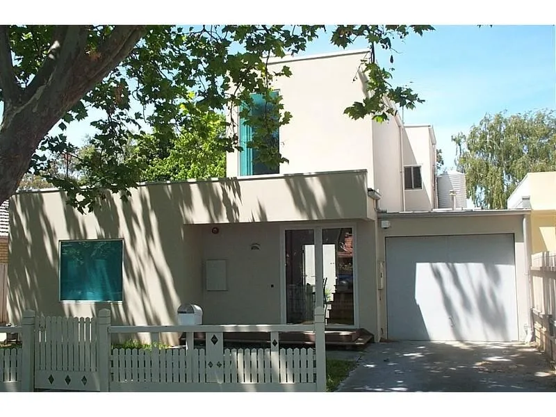 A Fun Filled Family Home Walking Distance to Bay Street Shops