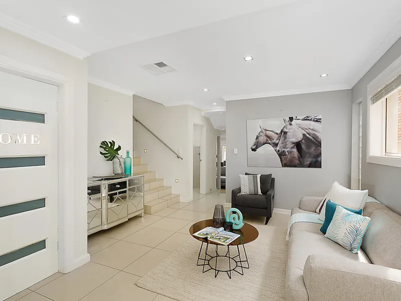 Commanding duplex in premier location 