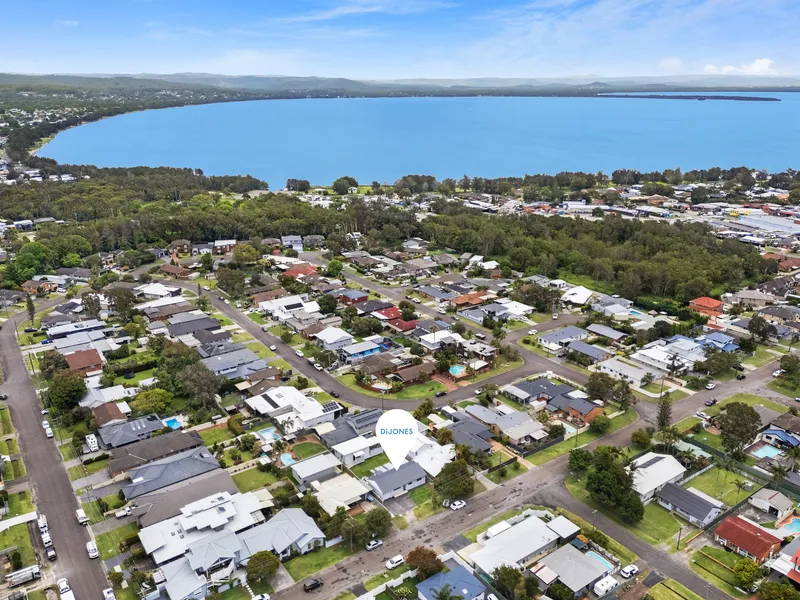 Newly Renovated Single Level, Coastal Themed, Income Producing Property Long Jetty