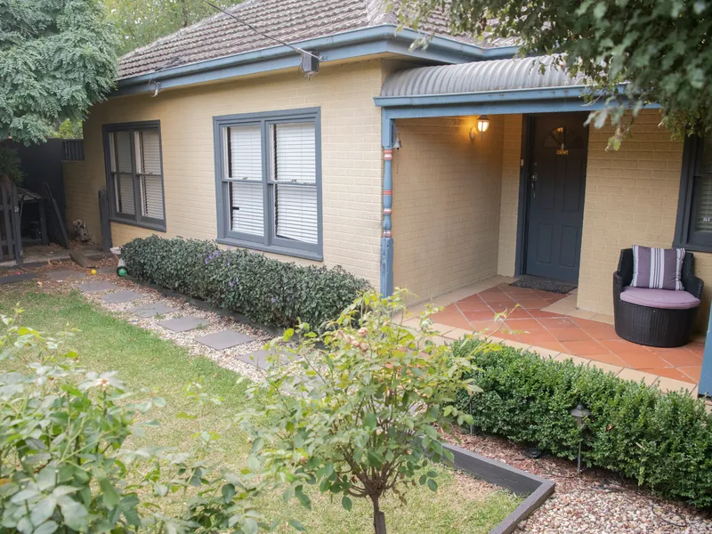 SPACIOUS SINGLE LEVEL UNIT WITH HIGH PRIVATE FENCE