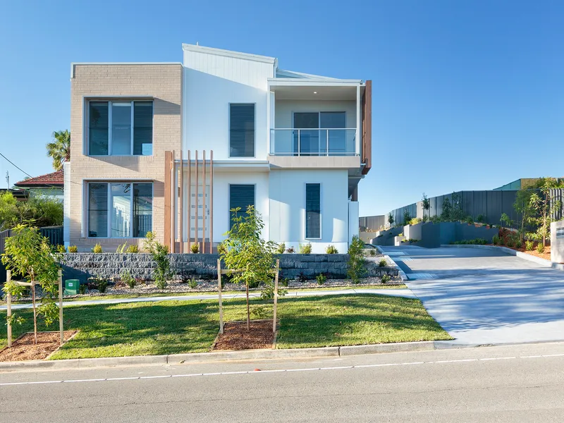 Near new townhouses in sought after elevated location