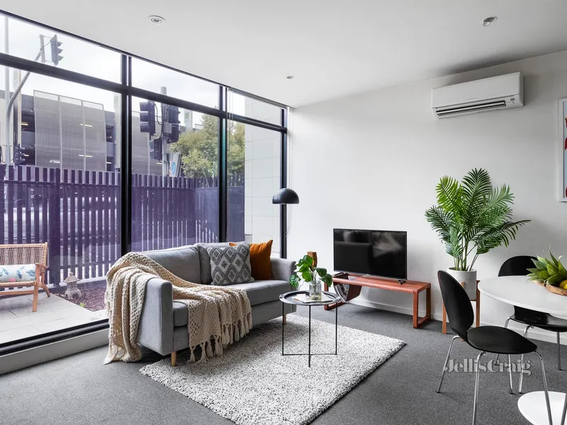 Private entry oasis with a sunny courtyard & parking