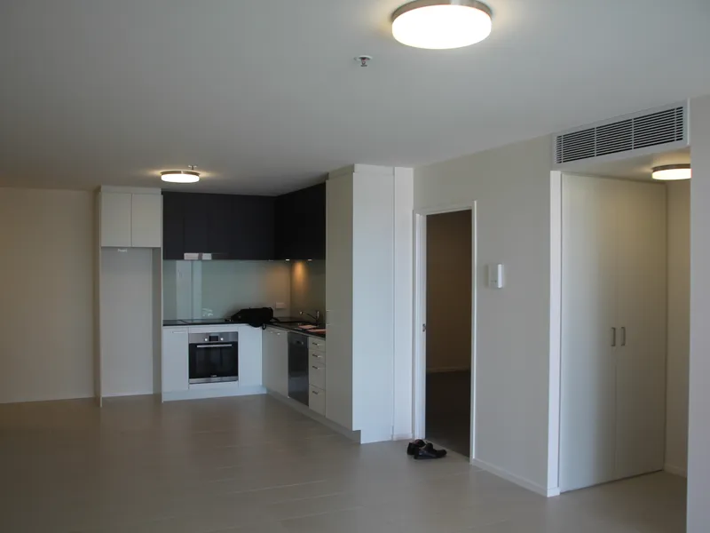 Large corner 2 bedroom, 2 bathroom unfurnished apartment...1 secure car park & storage