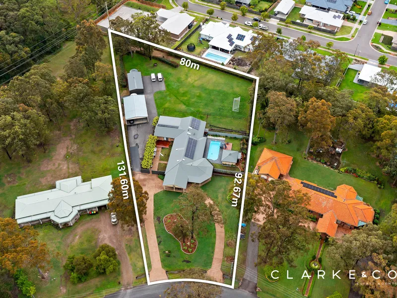 RESORT-STYLE ACREAGE LIVING!