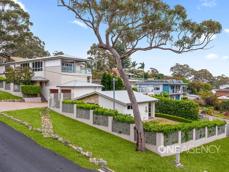 LUXURIOUS LIVING WITH PANORAMIC WATER VIEWS