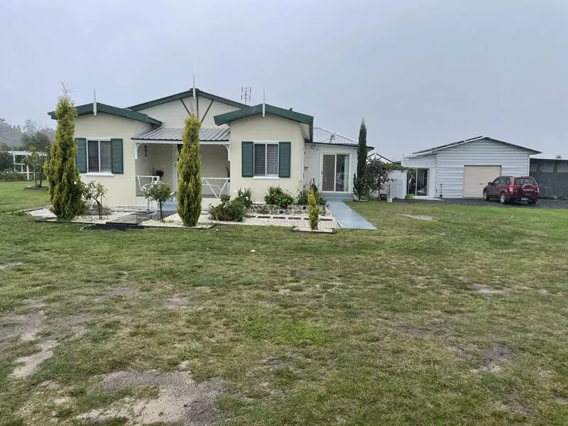 PICTURE PERFECT HOME ON 10 ACRES