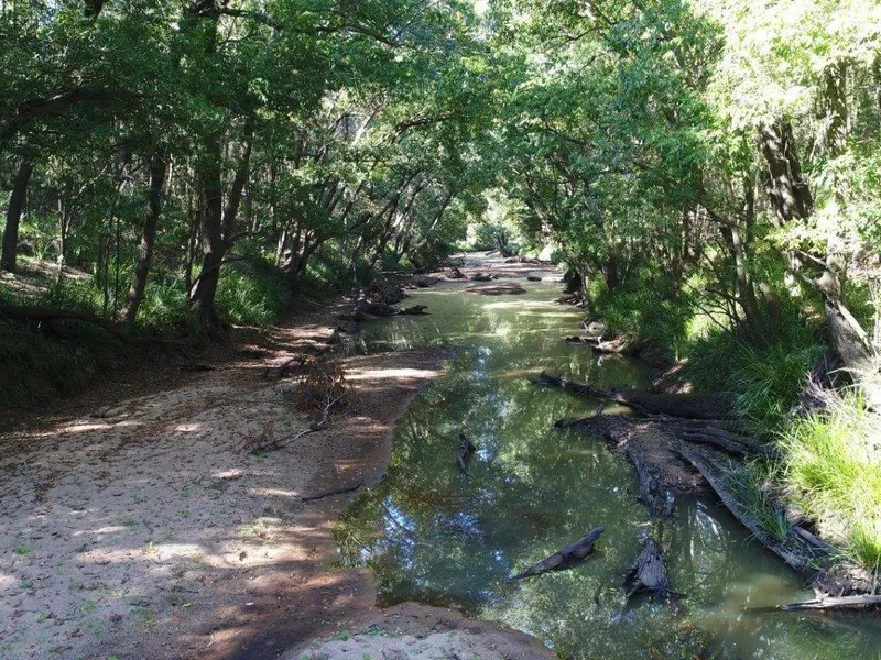 94.8 ACRES WITH FRESH WATER CREEK