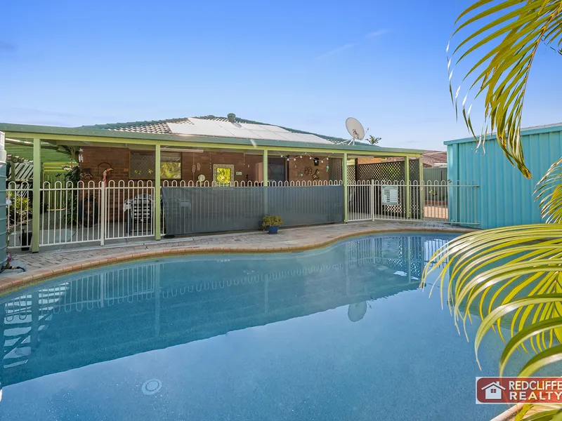 INVITING FAMILY HOME - BRICK AND TILE.