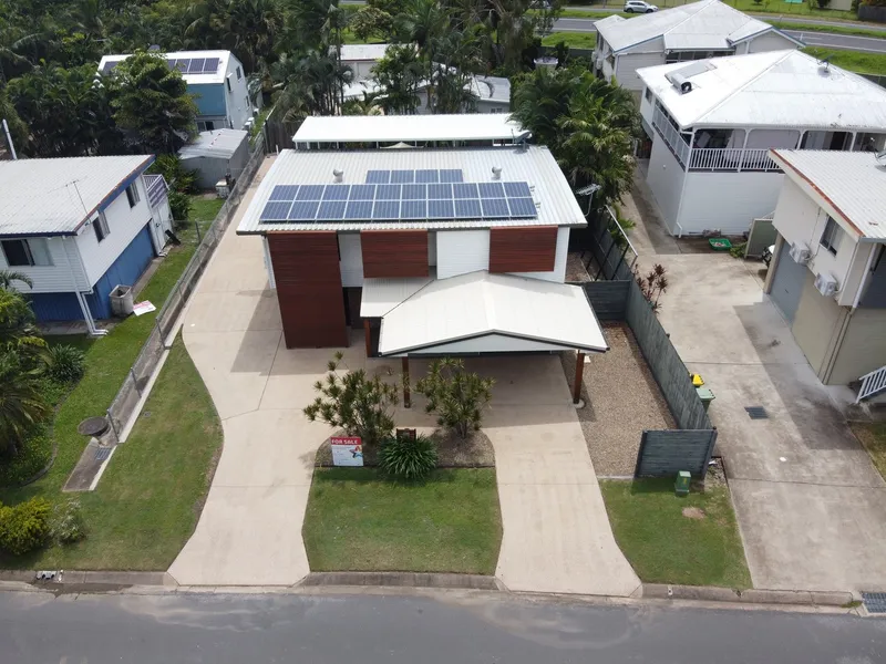 2 separate houses on a single title with only 1 rates bill, 1 water bill and 1 electricity bill.