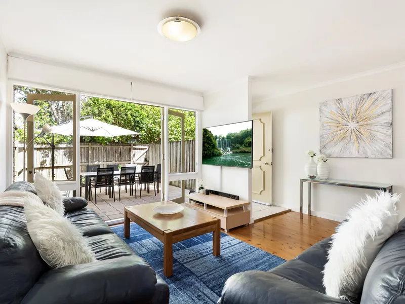 Inviting Coastal Townhouse Within Garden Sanctuary