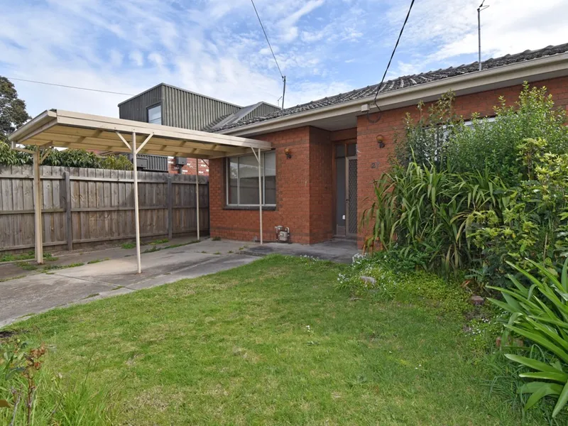 RENOVATED HOME IN THE McKINNON SECONDARY COLLEGE ZONE