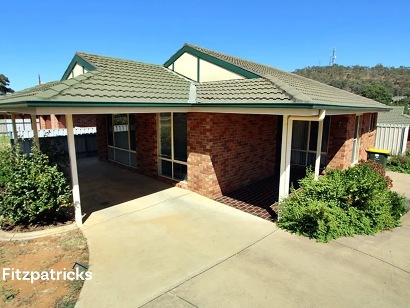 Located in a quiet set of two villas, this property is sure to impress. Features include: