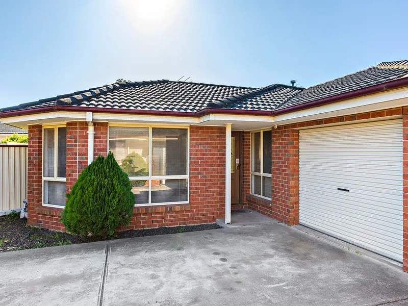 IMMACULATE THREE-BEDROOM HOME