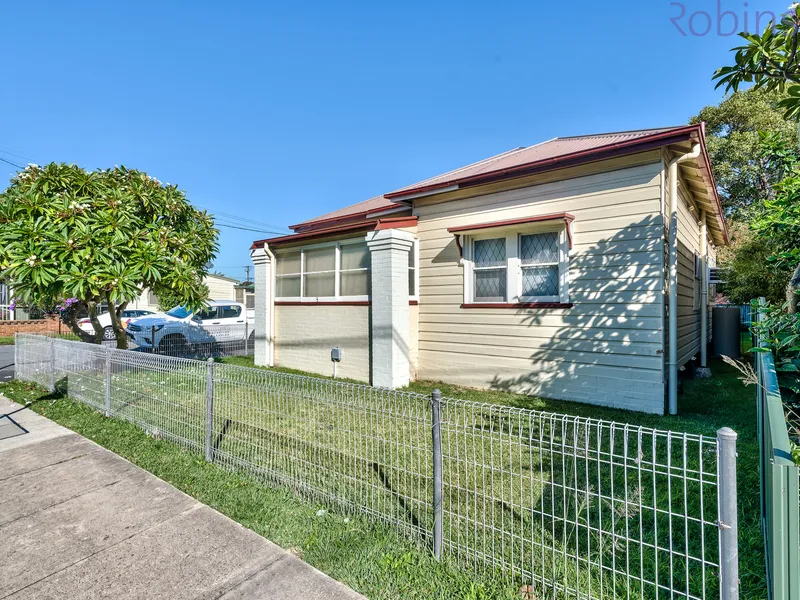 Three bedroom home with retro features. Pets considered!