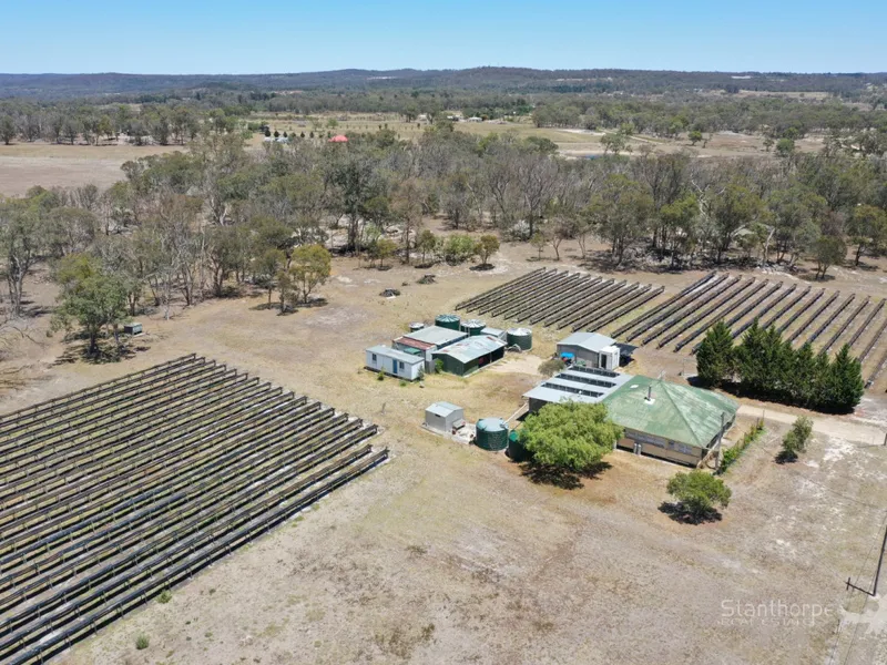 WONDERFUL HOME + INCOME POTENTIAL ON 10 ACRES IN TRANQUIL SETTING