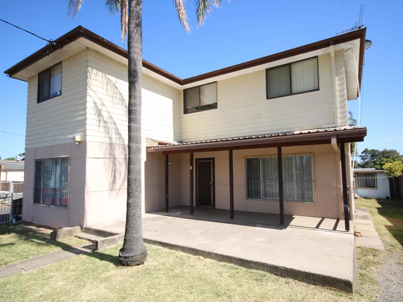 RARE R4 Zoning with street and laneway access.