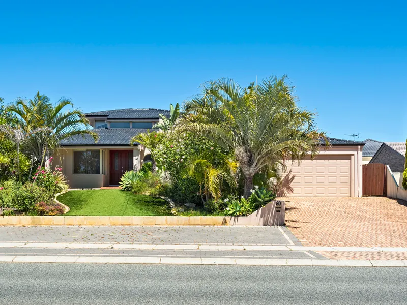 LARGE FAMILY HOME WITH STUNNING OUTDOOR LIVING JUST IN TIME FOR SUMMER!