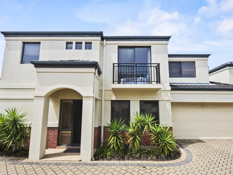 Modern Two-Storey Townhouse with Spacious Living and Prime Location