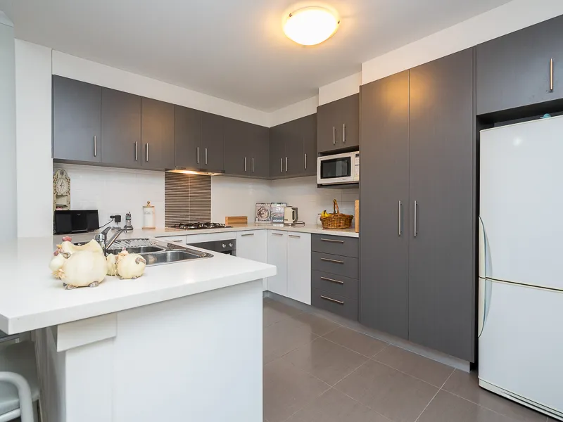 PERFECTLY LOCATED WITH 3 SEPARATE LIVING AREAS!