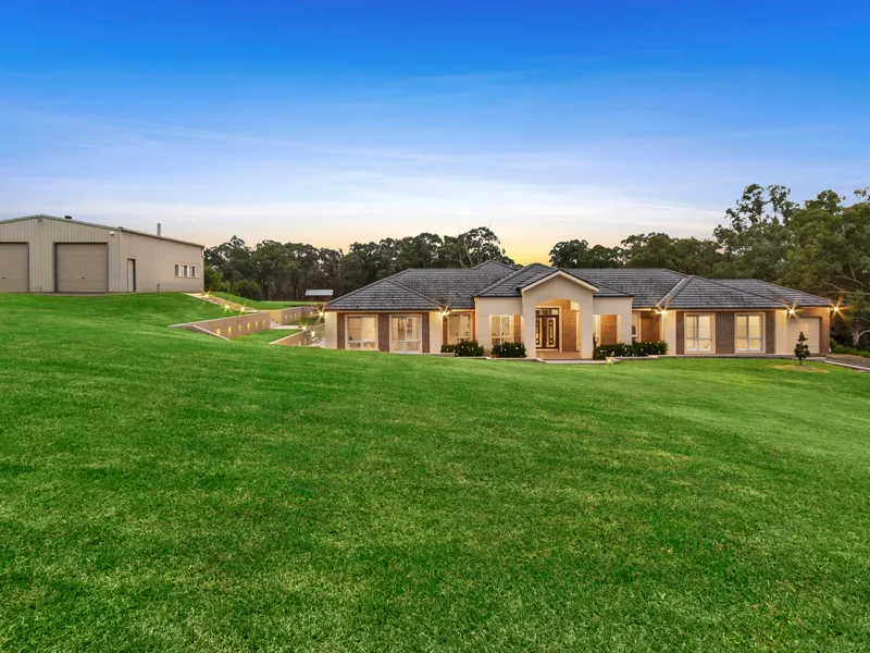 Modern single level home, quality acreage