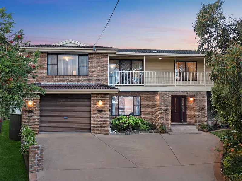 Large dual living residence with pool and ample garaging