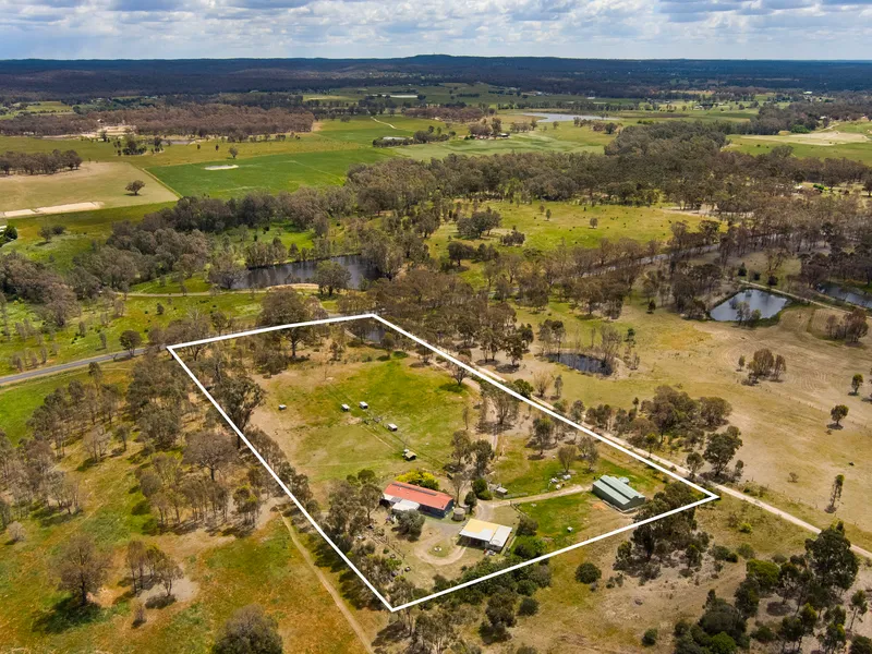 Feel the Serenity – Updated 4-Bedroom Home on 7.3 Acres in Axe Creek
