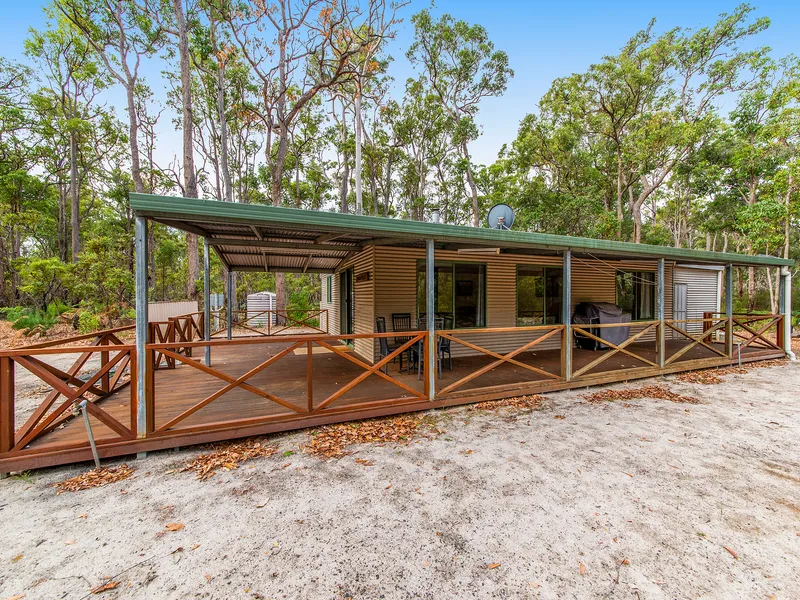 5.6 ACRES WITH COTTAGE