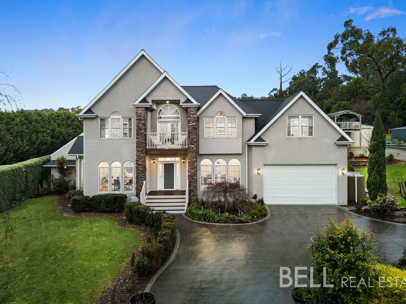 An Acre of Grandeur with Huge Barn Shed and Inground Pool