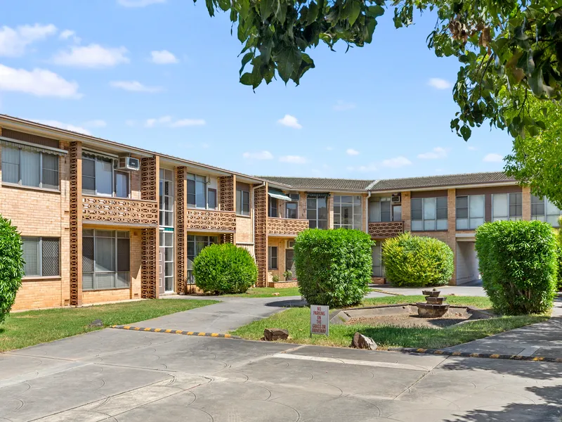 SPACIOUS, ELEVATED UNIT IN THIS VERY CONVENIENT LOCATION!!