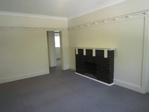 Spacious Two Bedroom + Sunroom Apartment
