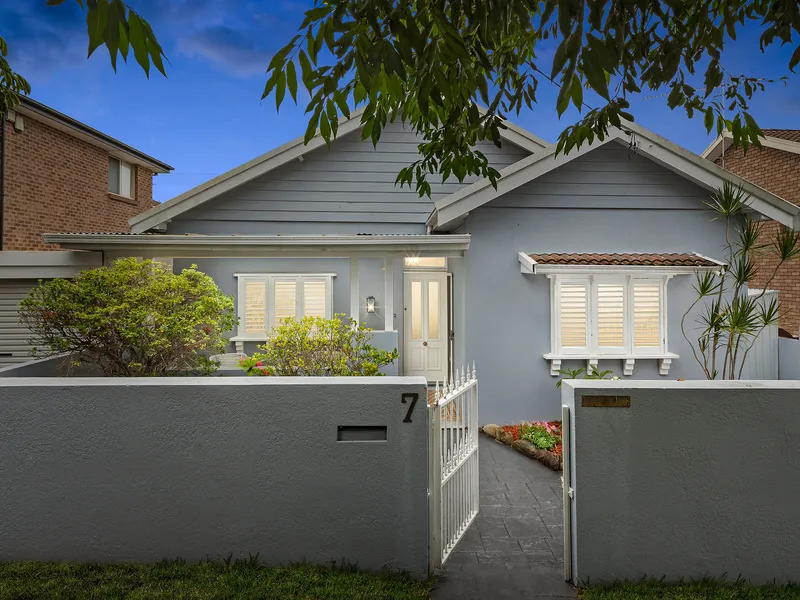Beautifully renovated brick bungalow on wide block