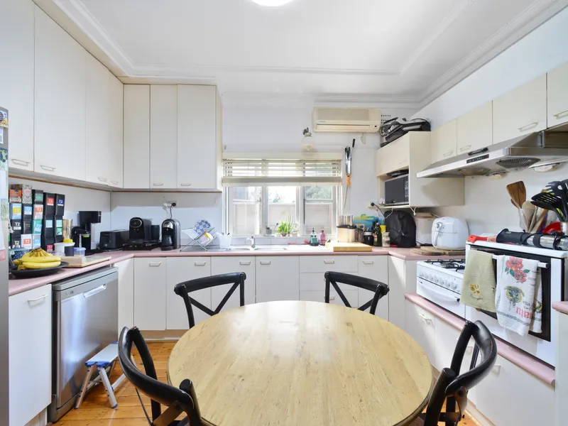 Versatile residence perfect for redevelopment or expansion!