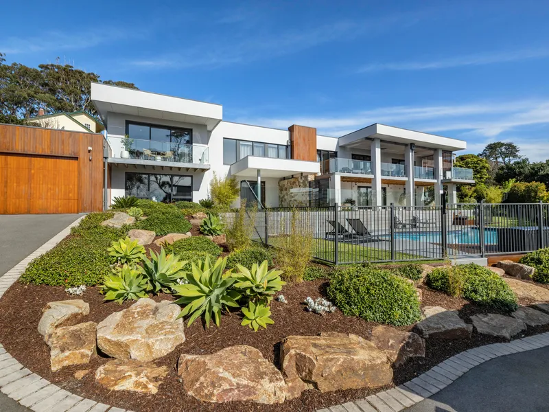 COASTAL LUXE WITH SHIMMERING BAY VIEWS