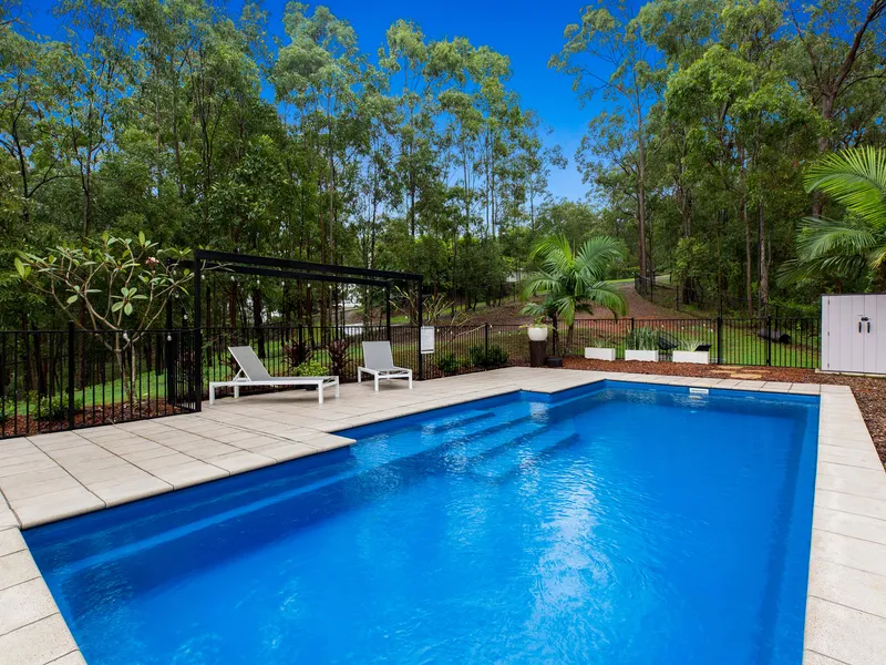 PRIVATE ACREAGE PARADISE WITH BLUE RIBBON OUTDOOR ENTERTAINING