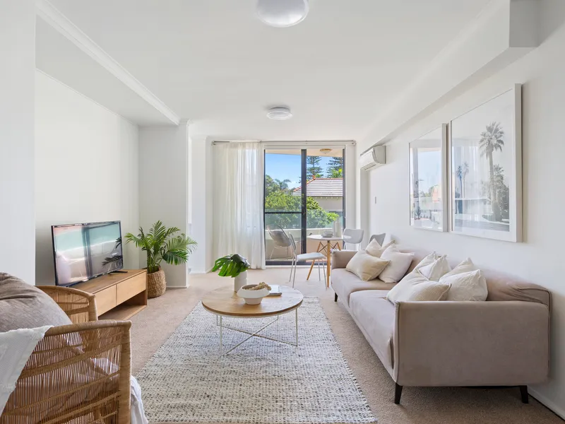 Sleek, spacious and sunlit beachside apartment