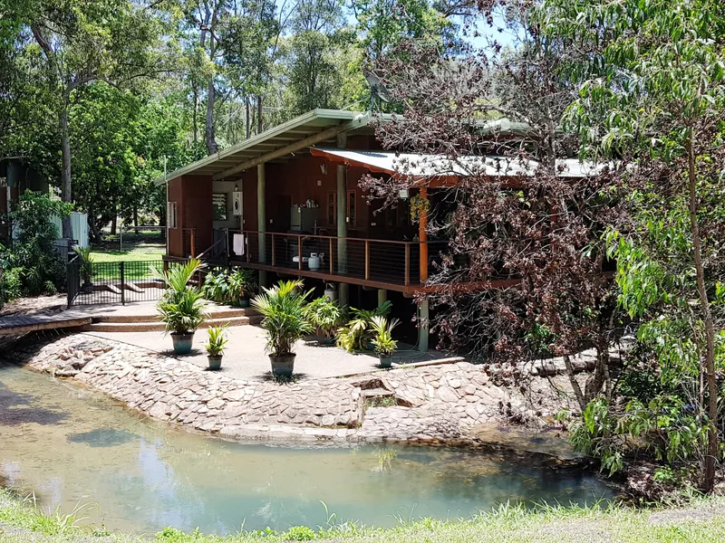 Outstanding three bedroom pole home on the banks of a seasonal creek.