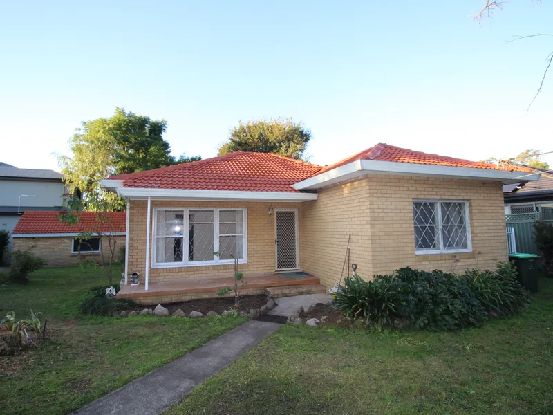 Decent Brick Home with Wide Frontage in Quiet Street near Denistone East Public School