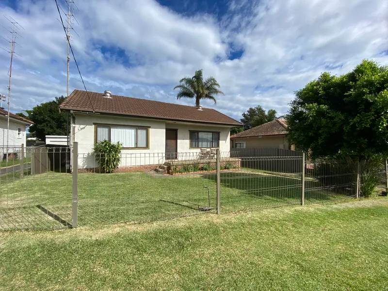 Centrally located home with fenced yard.