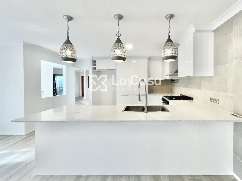 A world of exquisite design and unparalleled comfort at 21 Robinia Place.