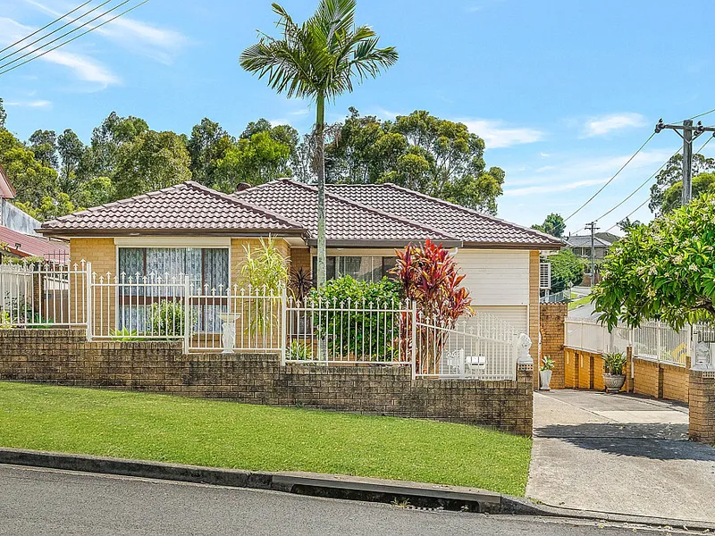 Brick Home On Elevated Corner Block