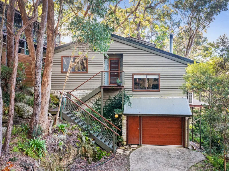 Tri-Level Home with Unique Features and Serene Bushland Setting