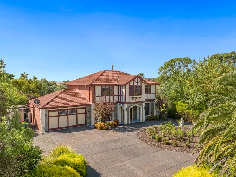 A Grand Manor with Flourishing Gardens