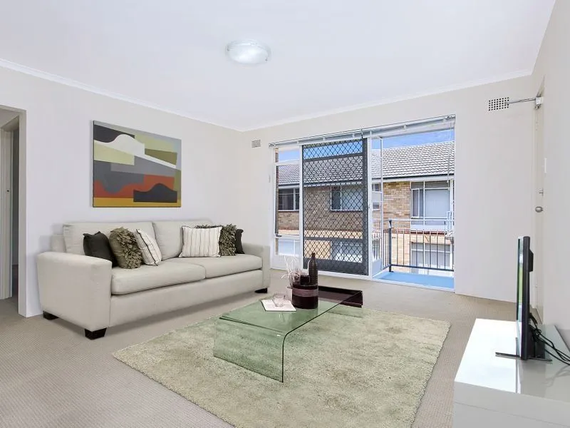 Conveniently Located, Sun-Filled And Spacious Top Floor Two Bedroom Apartment In A Central Location, Close To All Amenities