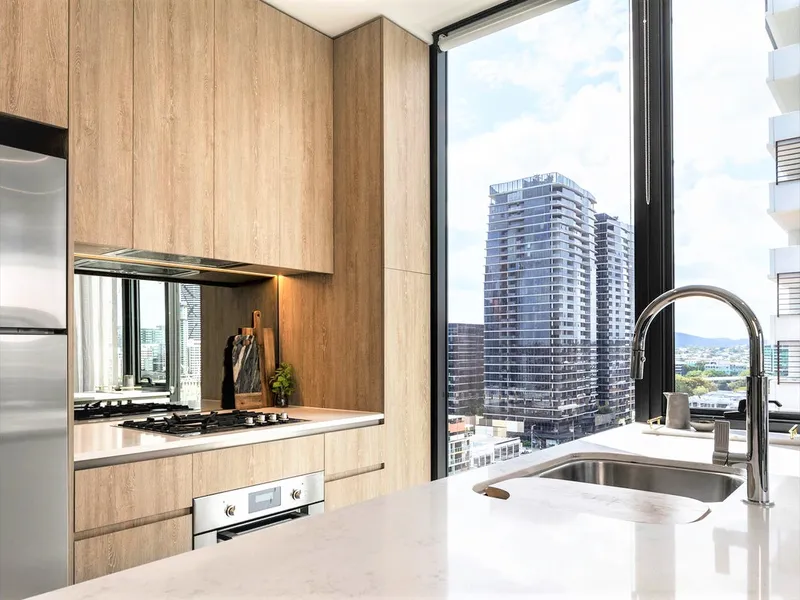 Large Unfurnished City View, Corner situated North West aspect 2 bedroom, 2 bathroom & 1 car space apartment.