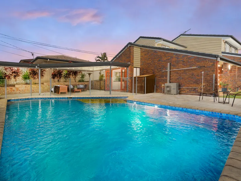 Summer ready home, walking distance to John Paul College...