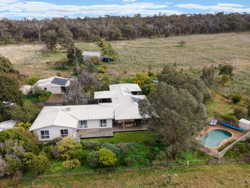 MASSIVE FAMILY HOME ON 74 ACRES