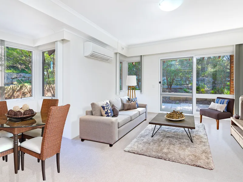 Enviable unit offers as-new presentation and idyllic location