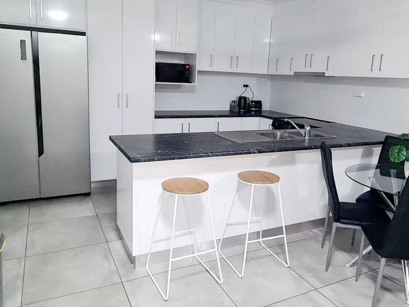 Private secure townhouse conveniently located
