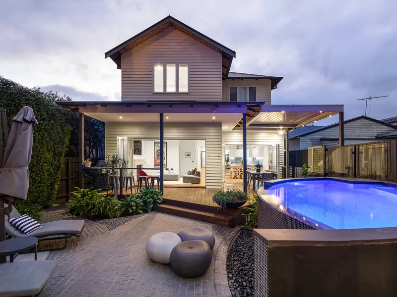 A picture of poolside family perfection with self contained studio