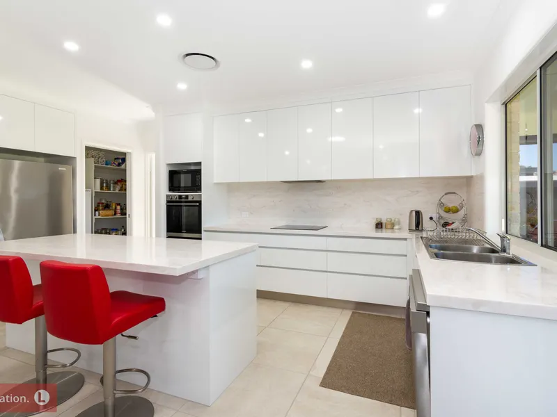 STUNNING COASTAL HOME ON A LARGE PRIVATE BLOCK + SOLAR!